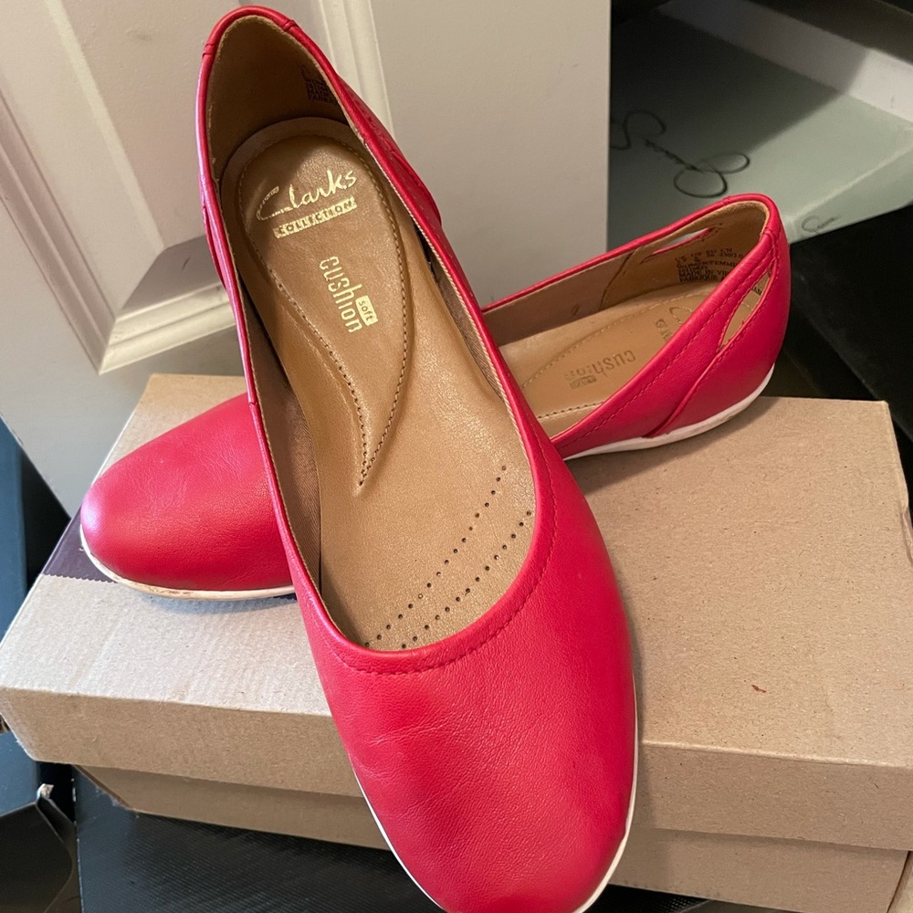 Like new Clarks red slip on shoes